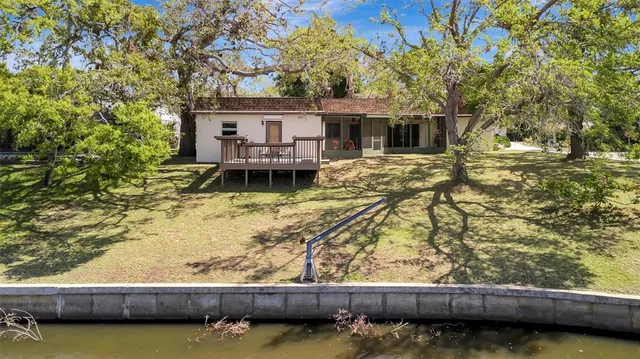 swimming pool view with a seating space