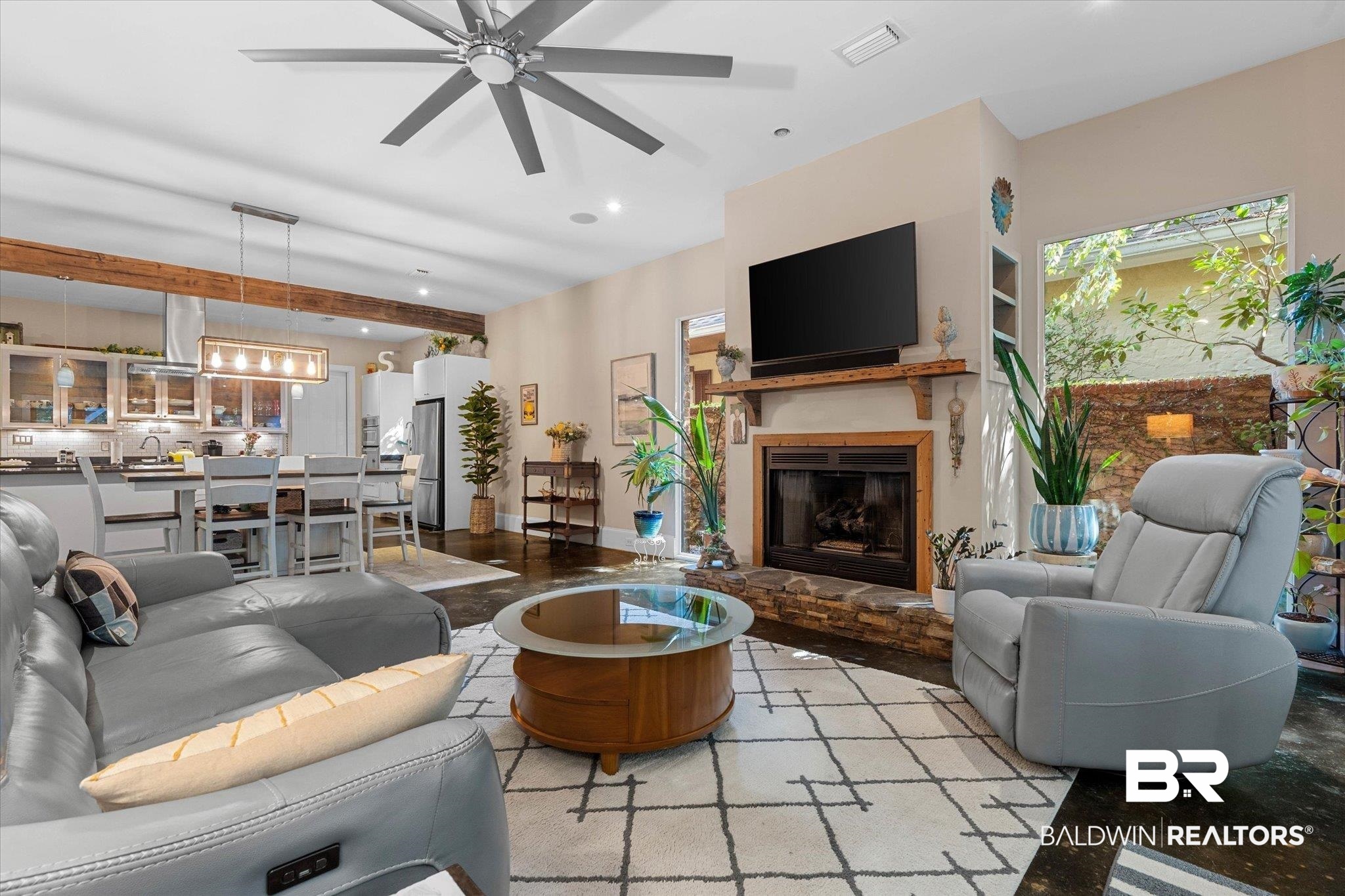 3400 Rue Royal Mobile, AL 36693 - Photo 6 of 33 Living area featuring ceiling fan, a glass covered fireplace, and recessed lighting