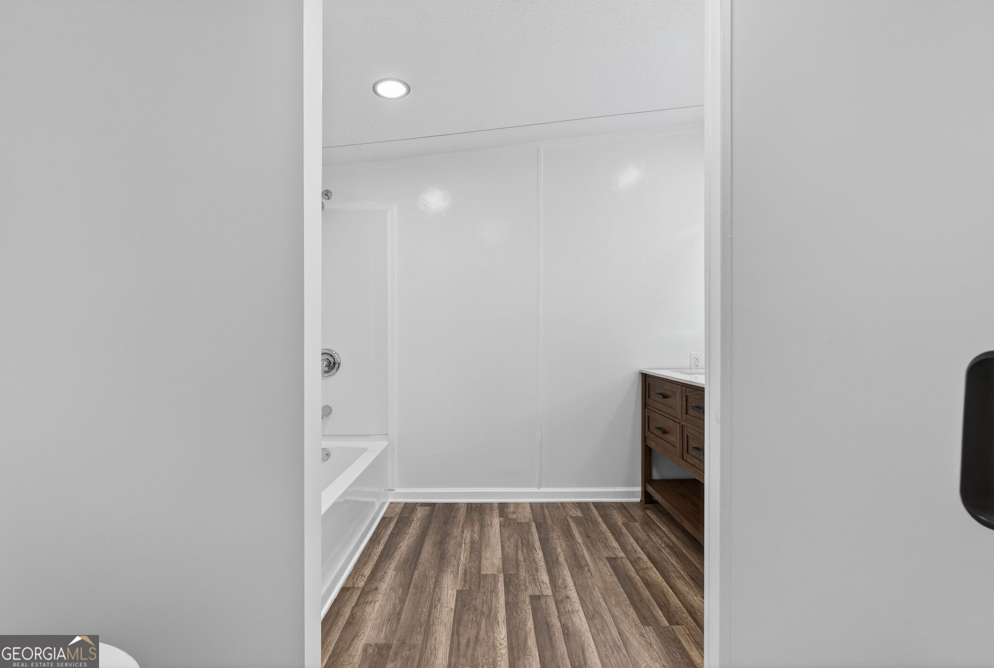 459 Hay Road Meansville, GA 30256 - Photo 21 of 36 a view of a room with wooden floor