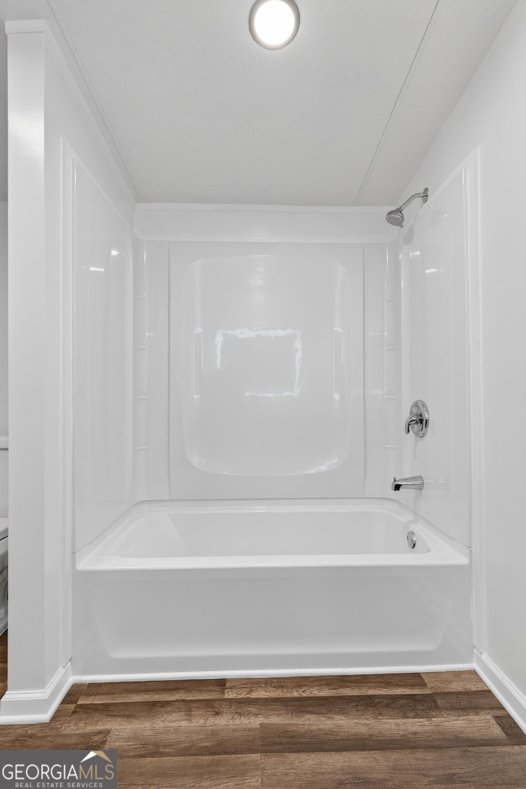 459 Hay Road Meansville, GA 30256 - Photo 23 of 36 a bathroom with bathtub and shower