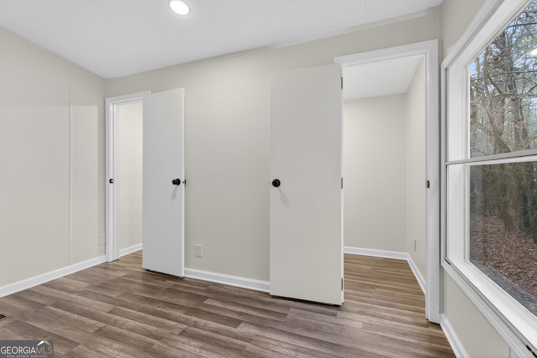 459 Hay Road Meansville, GA 30256 - Photo 30 of 36 a view of a hallway with wooden floor