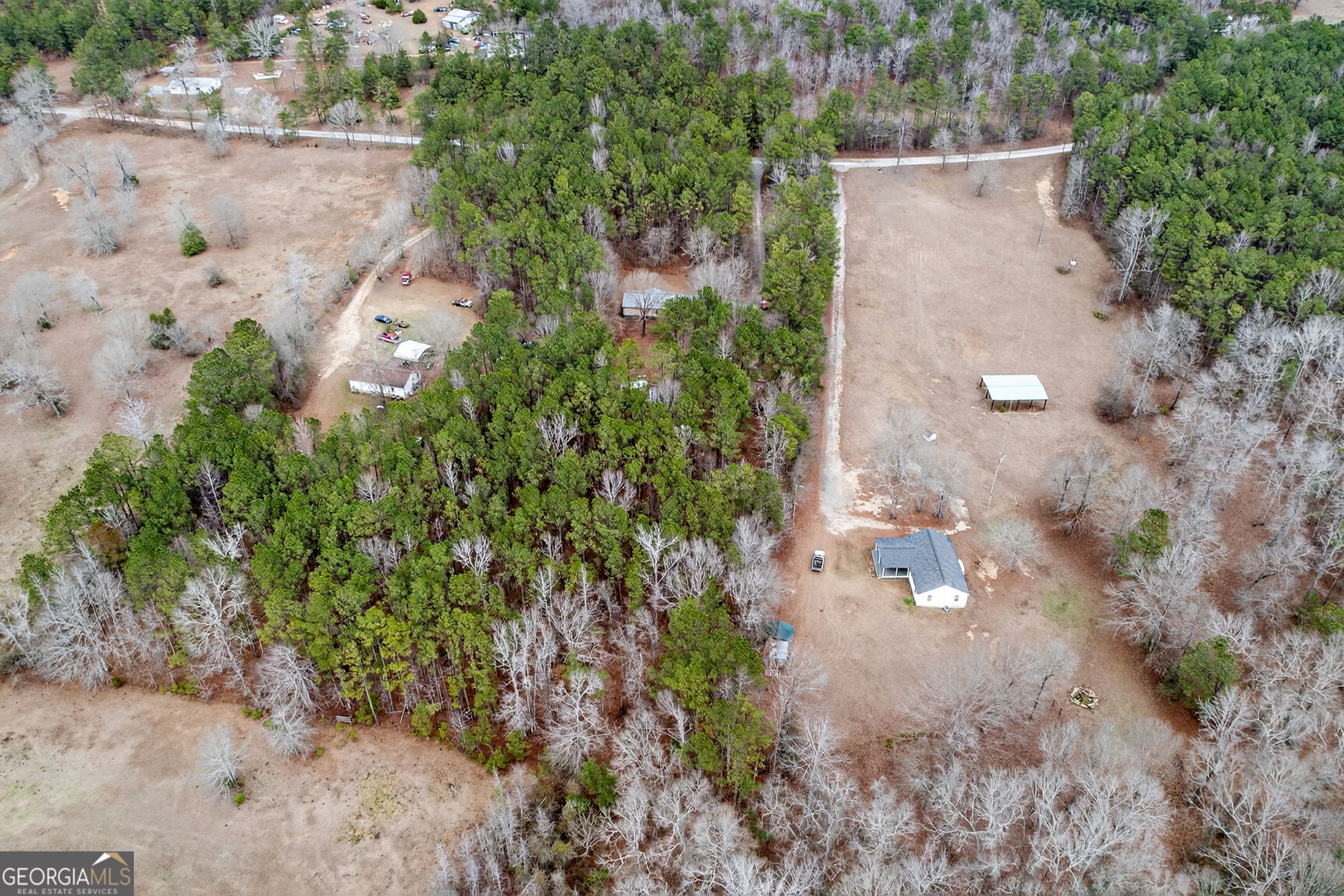 459 Hay Road Meansville, GA 30256 - Photo 35 of 36 an aerial view of residential house with outdoor space
