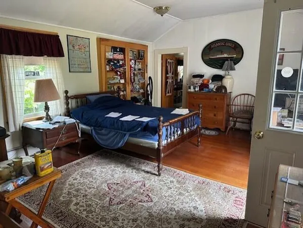 a bathroom with a sink toilet and mirror