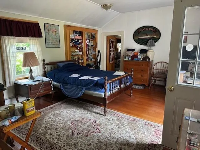 a bathroom with a sink toilet and mirror