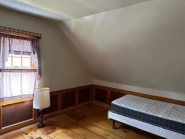 a room with a table and a mirror