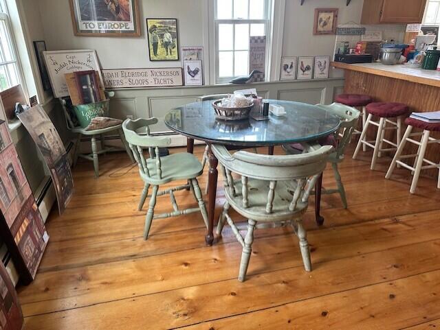 110 Depot Street Dennis Port, MA 02639 - Photo 7 of 27 a view of a dining room with furniture and wooden floor