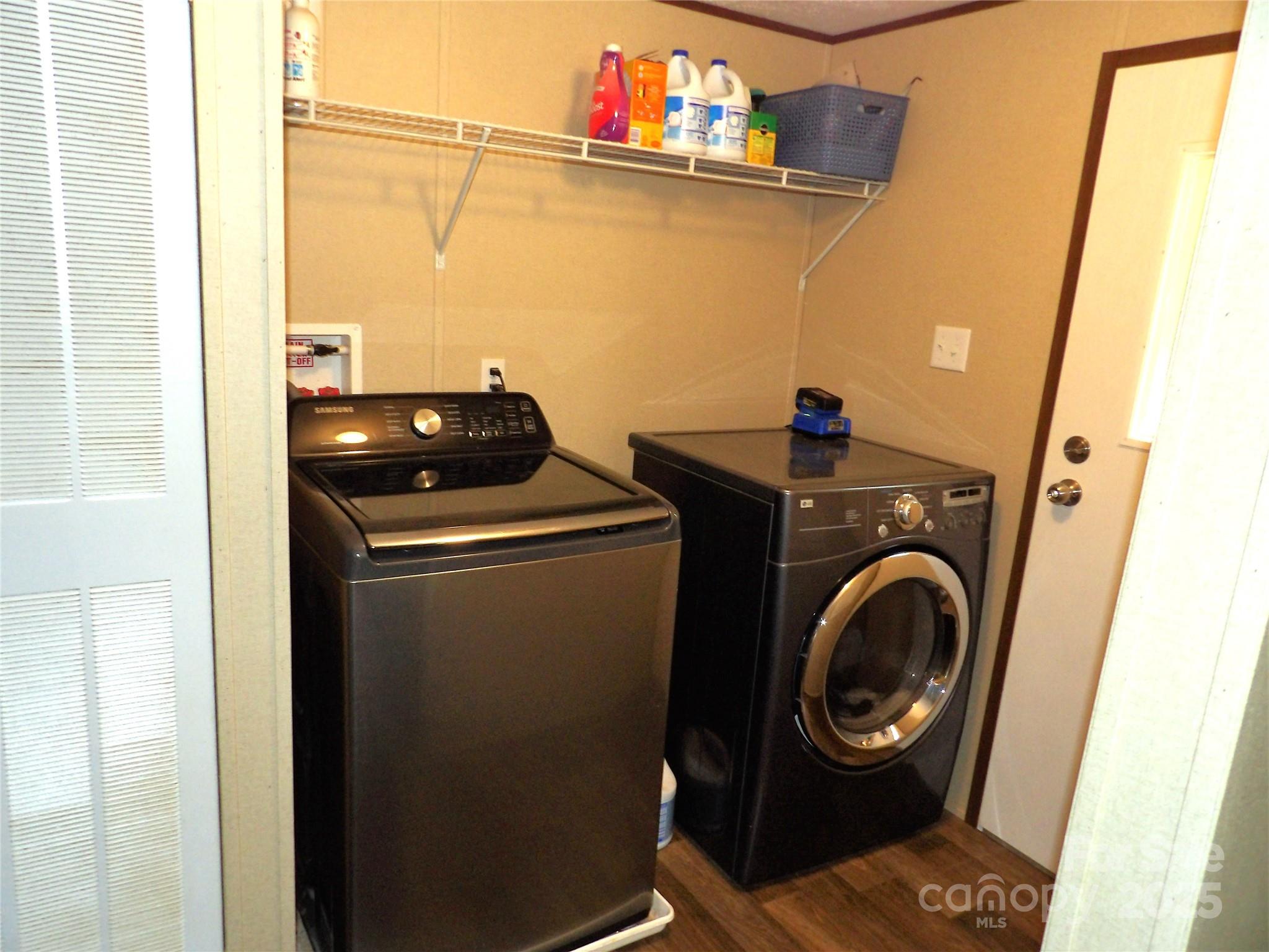 31 McGee Hl Road Fairview, NC 28730 - Photo 21 of 21 a utility room with dryer and washer
