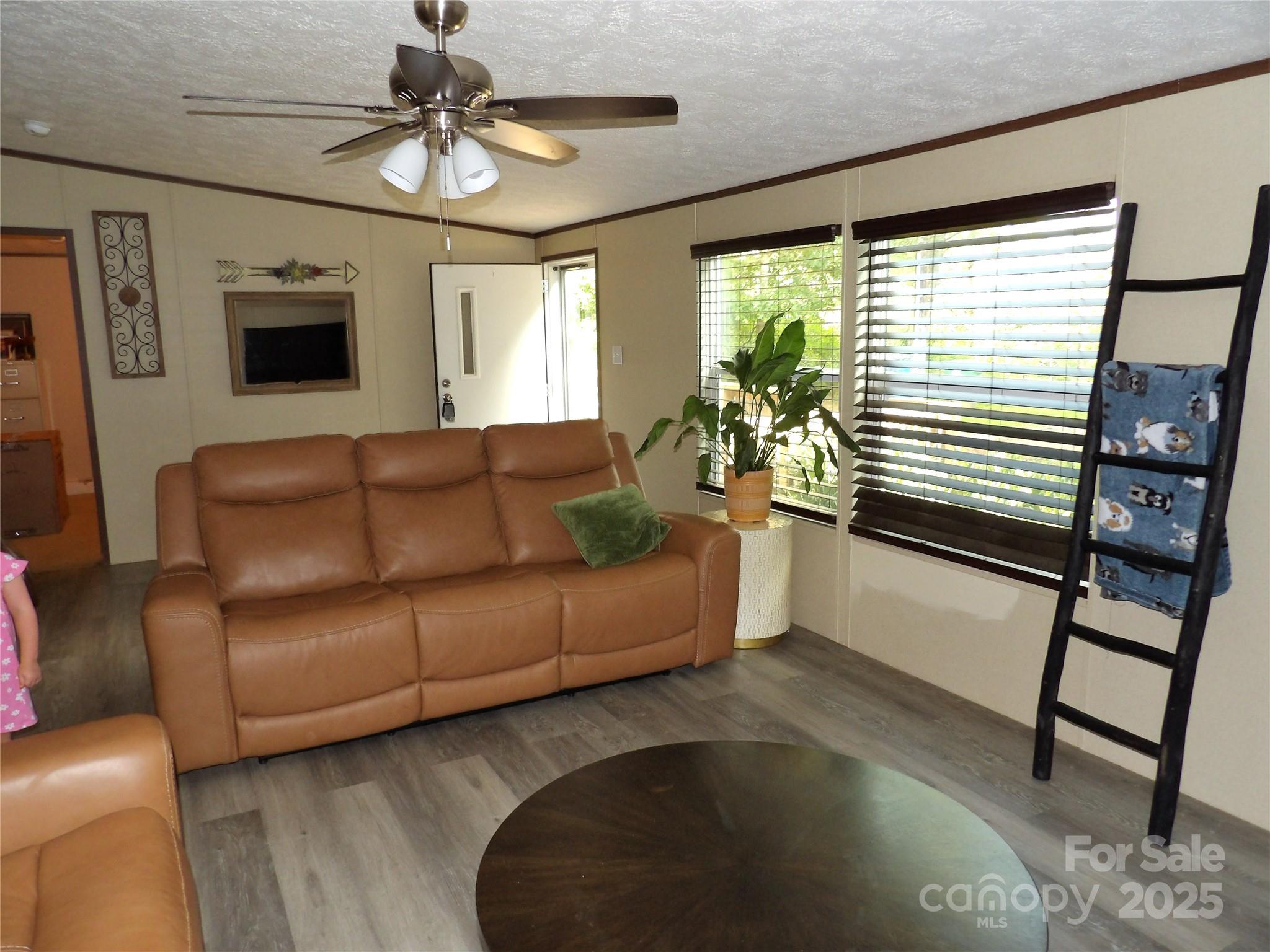 31 McGee Hl Road Fairview, NC 28730 - Photo 8 of 21 a living room with furniture and a window