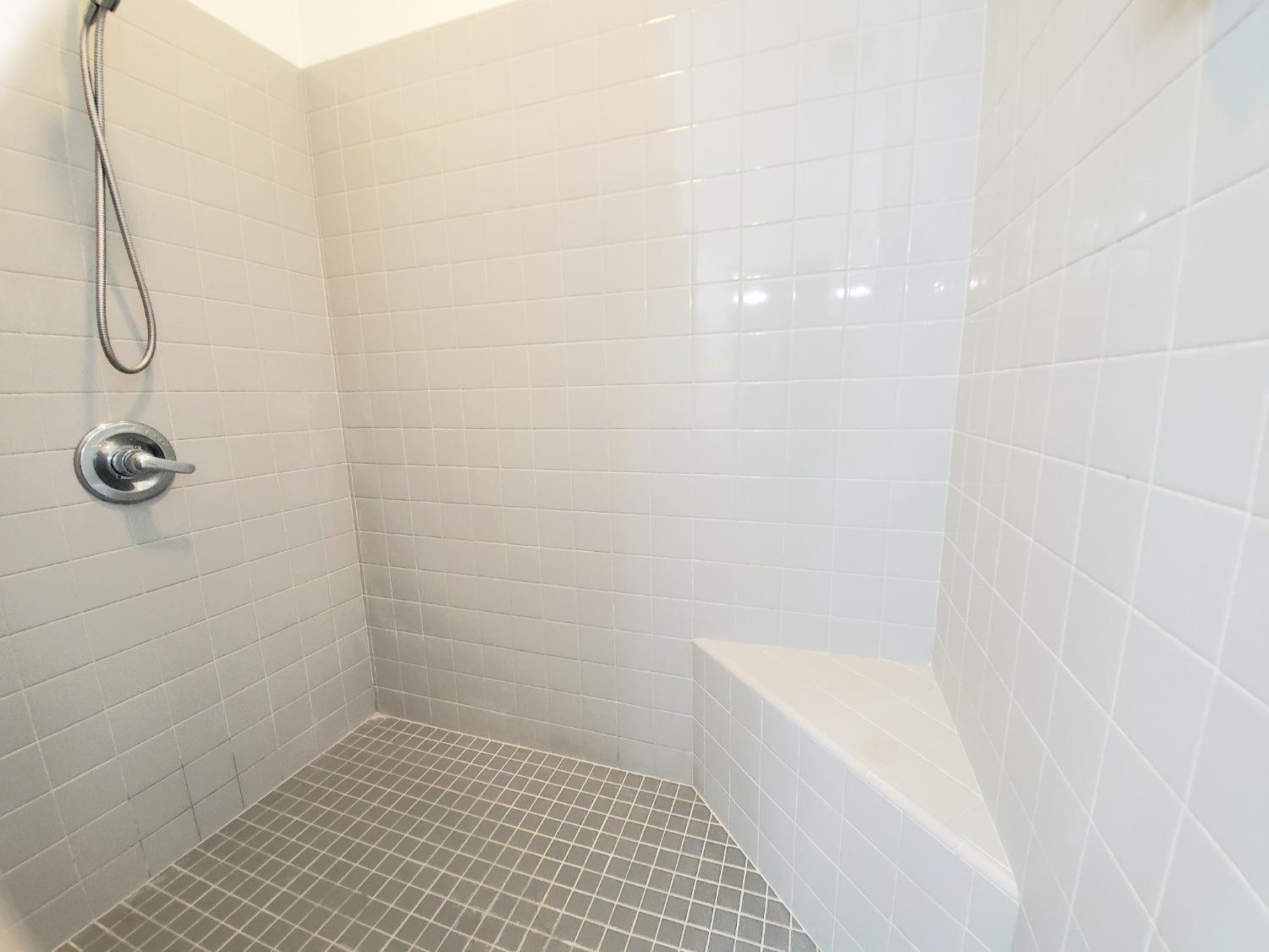 359 Amber Dinuba, CA 93618 - Photo 14 of 22 a bathroom with a shower