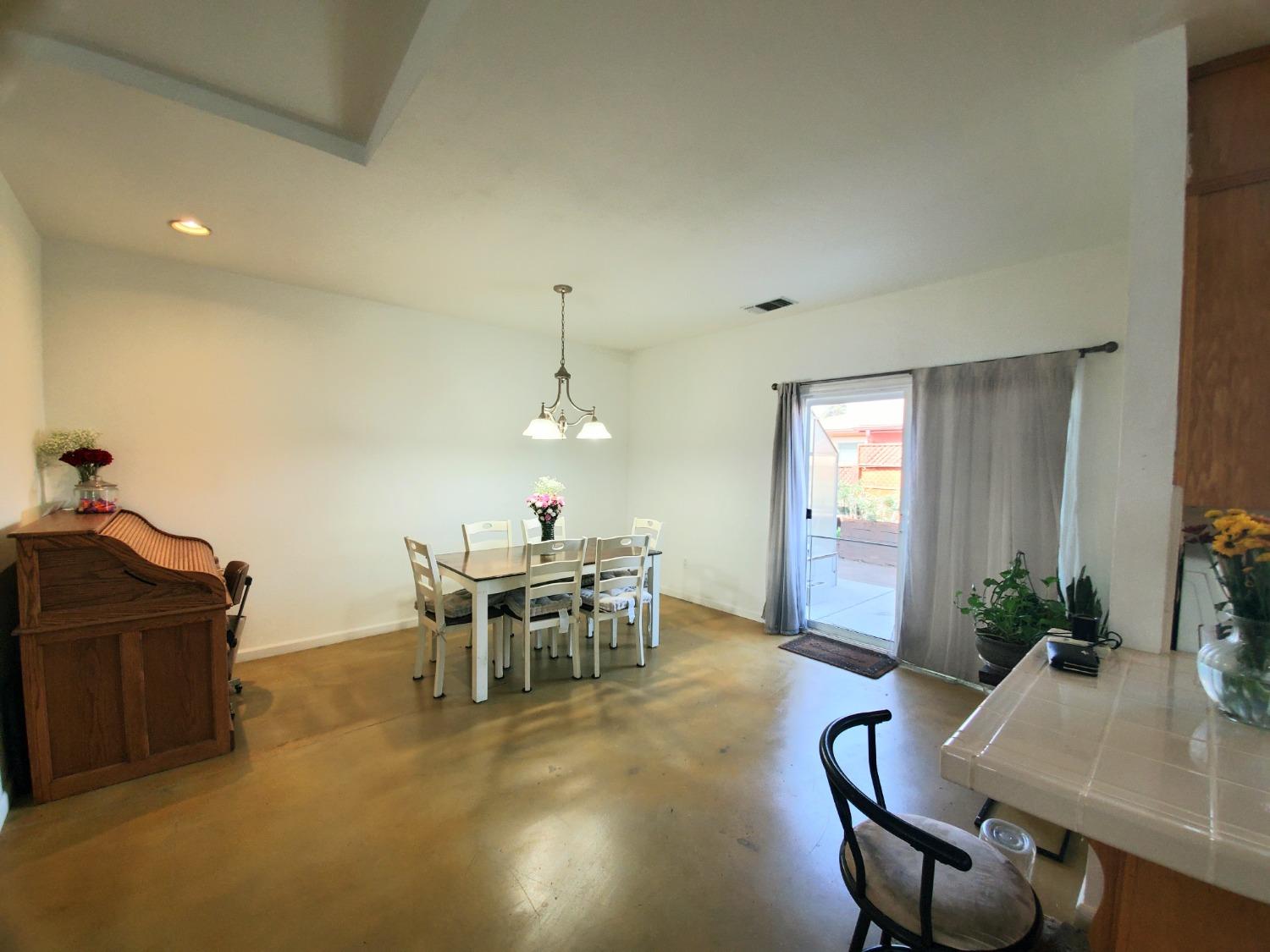 359 Amber Dinuba, CA 93618 - Photo 6 of 22 a view of a dining room with furniture