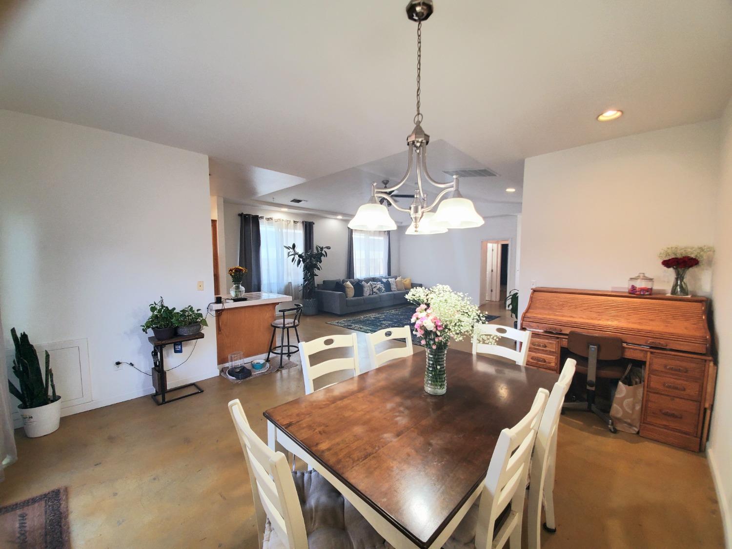 359 Amber Dinuba, CA 93618 - Photo 7 of 22 a view of a dining room with furniture