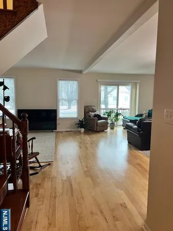 a room with gym equipment and a window