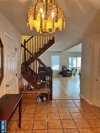 a kitchen with stainless steel appliances a refrigerator sink a stove a microwave and cabinets