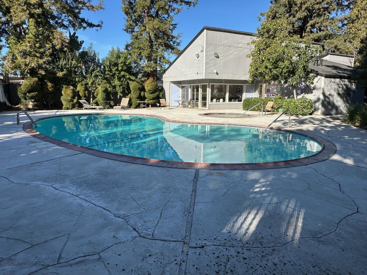 2212 Almaden Road, Unit A San Jose, CA 95125 - Photo 14 of 15 a view of a house with a yard and palm trees