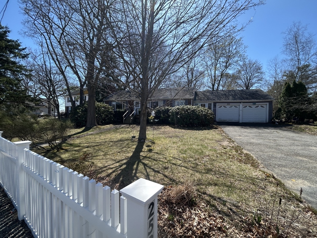 258 Kendrick Street Needham, MA 02494 - Photo 1 of 1 a view of a yard covered with snow in front of house