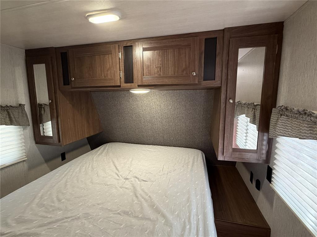 3000 Clarcona Road, Unit 743 Apopka, FL 32703 - Photo 36 of 54 a bed room with a bed and a window