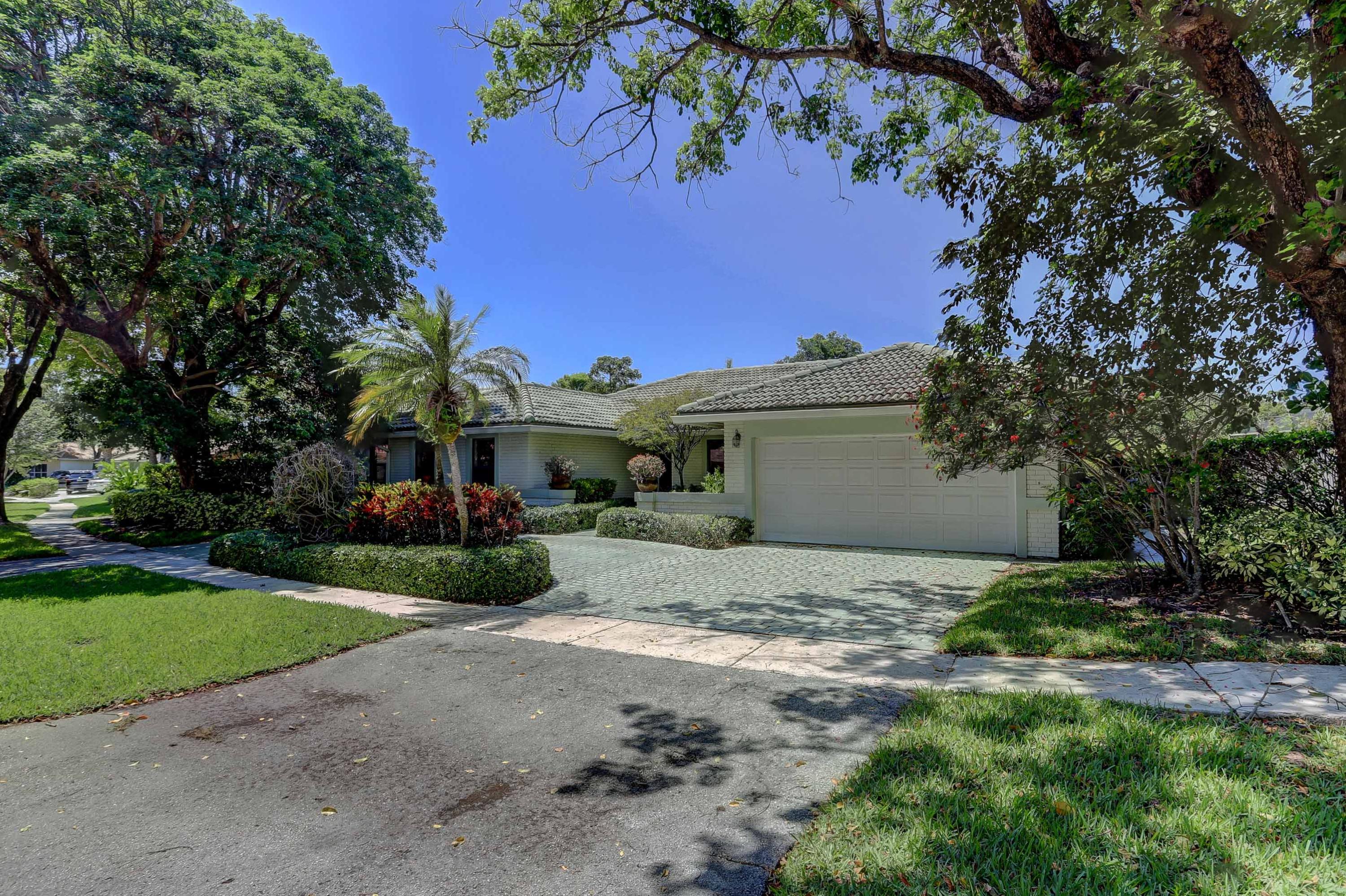 6835 Viento Way Boca Raton, FL 33433 - Photo 1 of 43 a view of a house with a tree in front of it