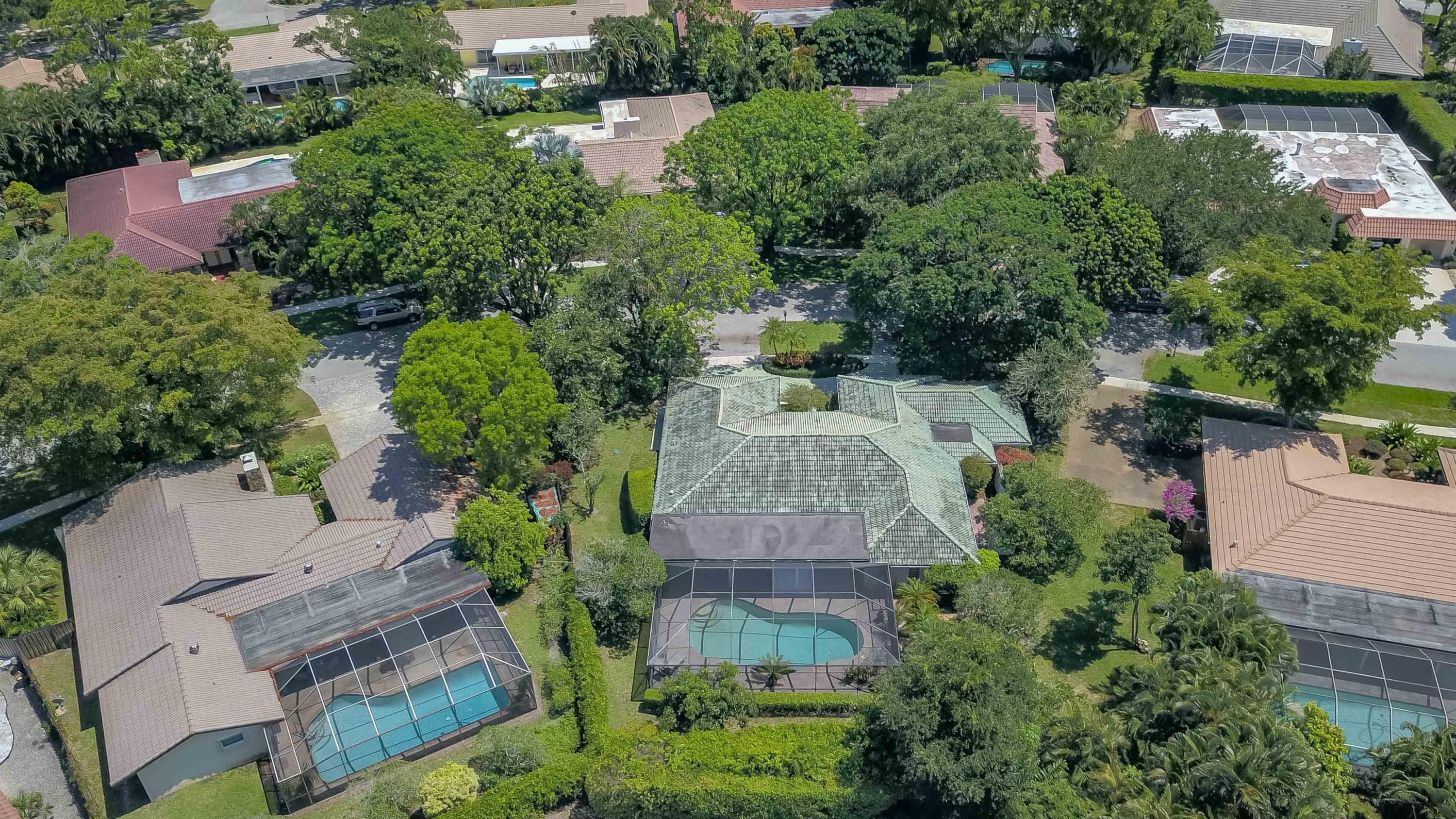 6835 Viento Way Boca Raton, FL 33433 - Photo 41 of 43 an aerial view of a house with a yard