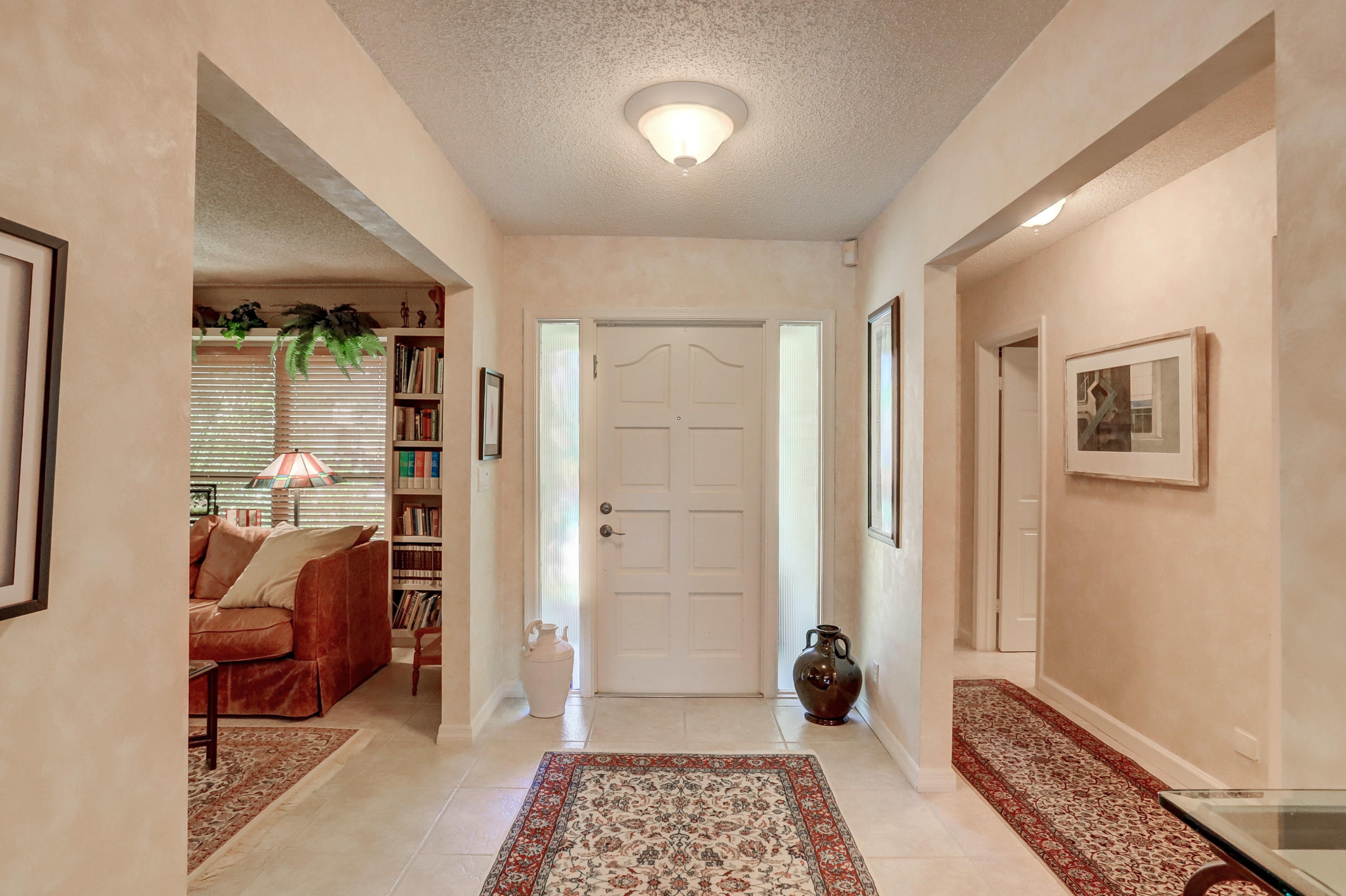 6835 Viento Way Boca Raton, FL 33433 - Photo 5 of 43 a bedroom with furniture and a window