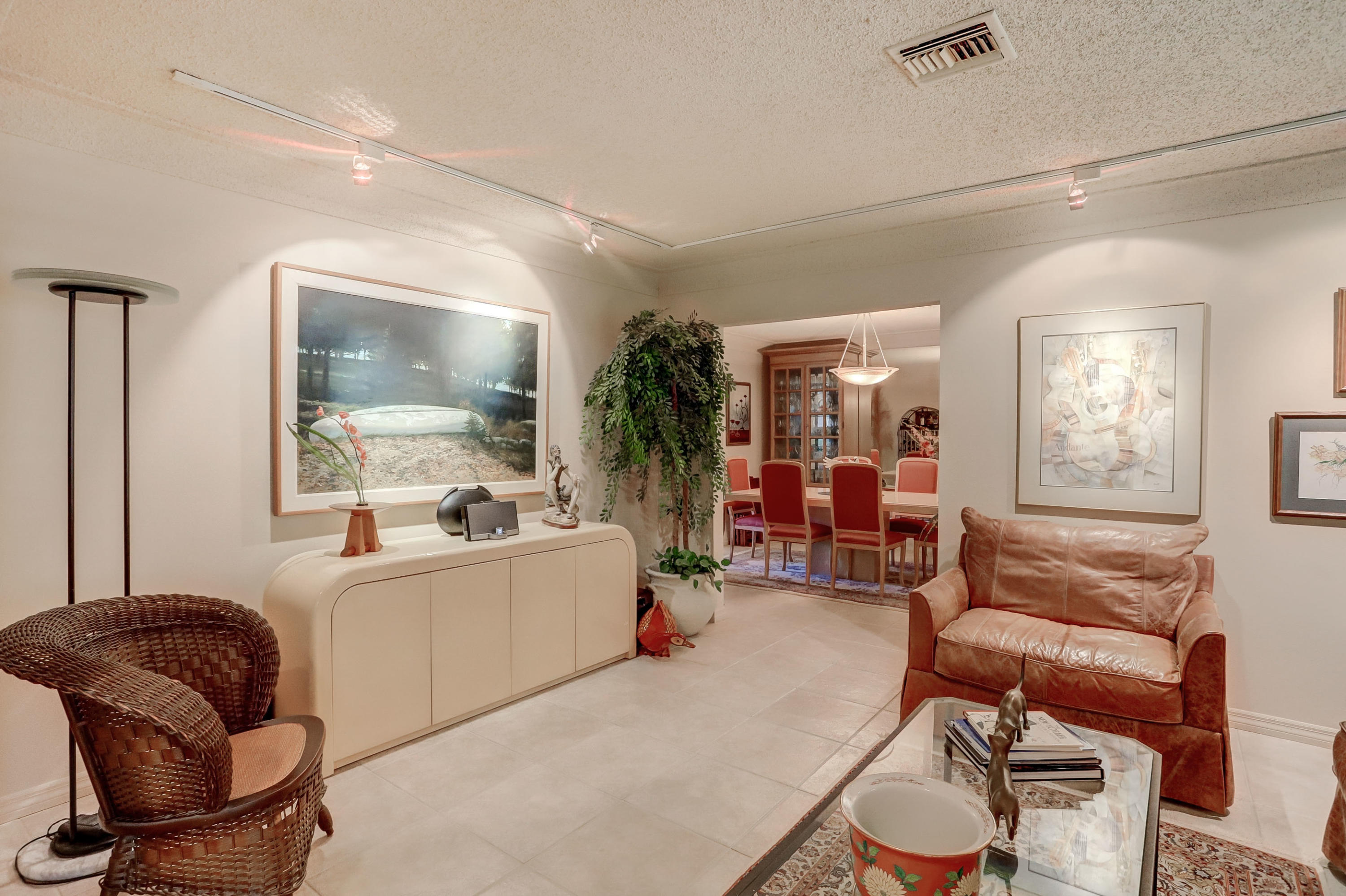 6835 Viento Way Boca Raton, FL 33433 - Photo 8 of 43 a living room with furniture and a large window