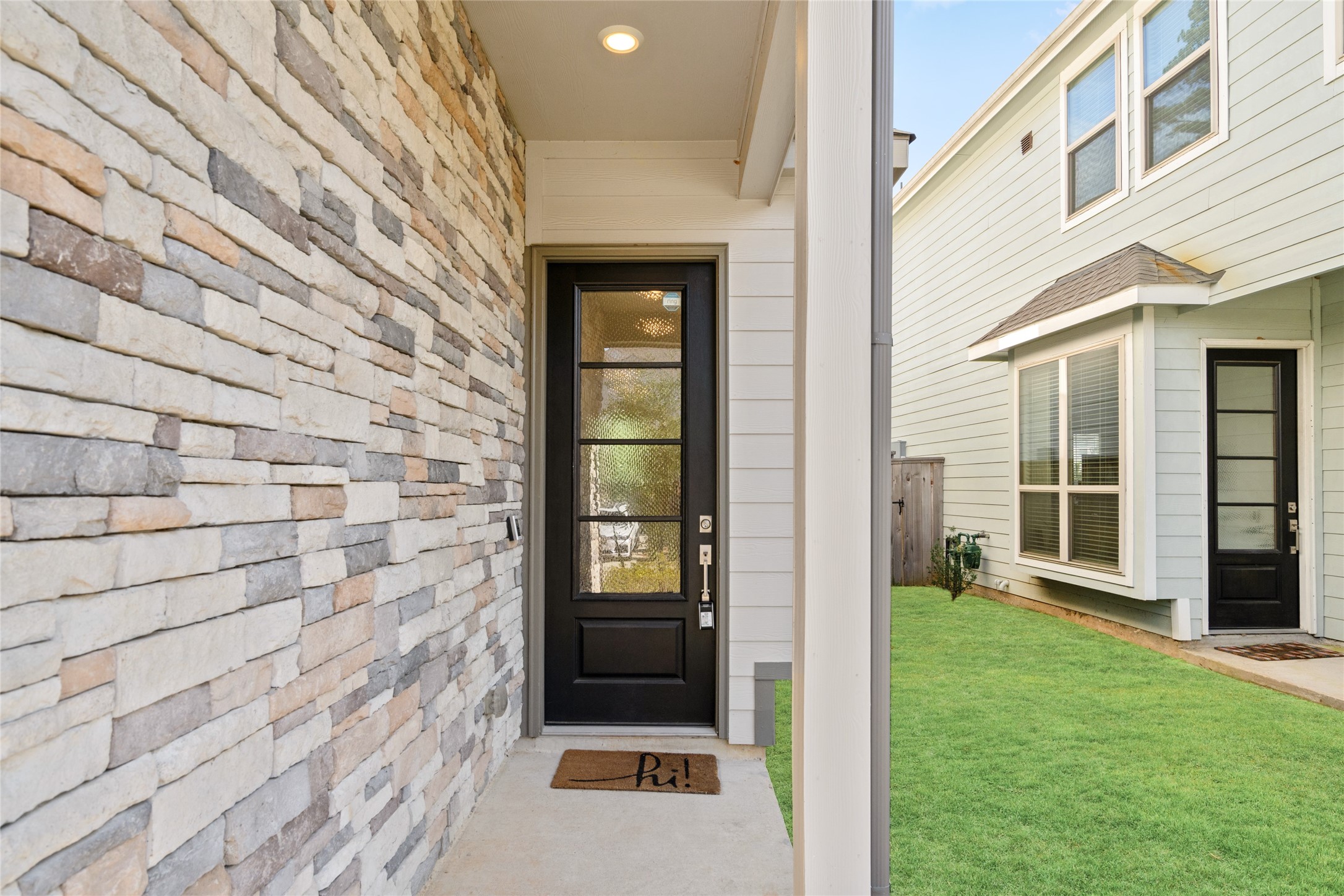 575 Dry Fork Lane Conroe, TX 77304 - Photo 25 of 34 Charming covered entry at the front of the home.