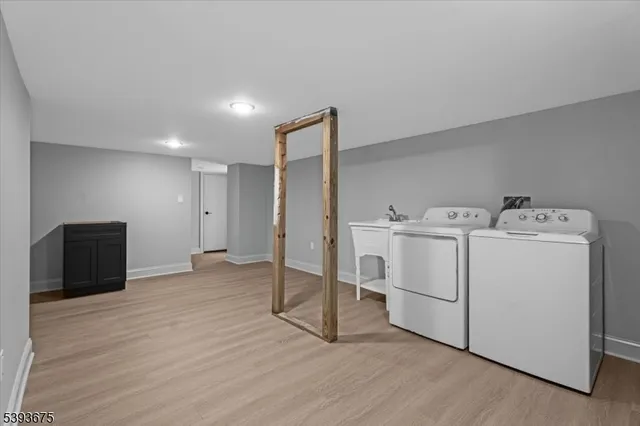 a view of utility room with washer and dryer