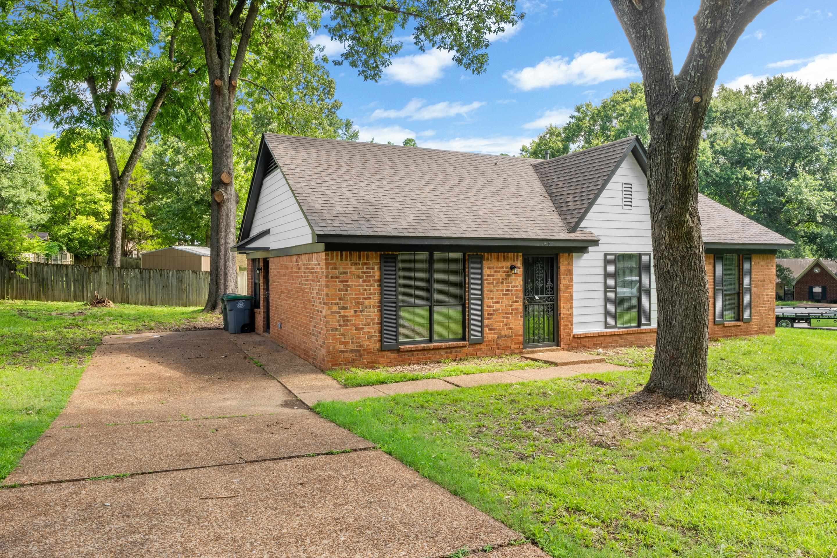 6400 Saginaw Road Memphis, TN 38134 - Photo 26 of 27 Extended driveway provides convenient parking and easy access to the home.