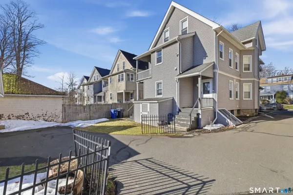 a front view of a house with swimming pool