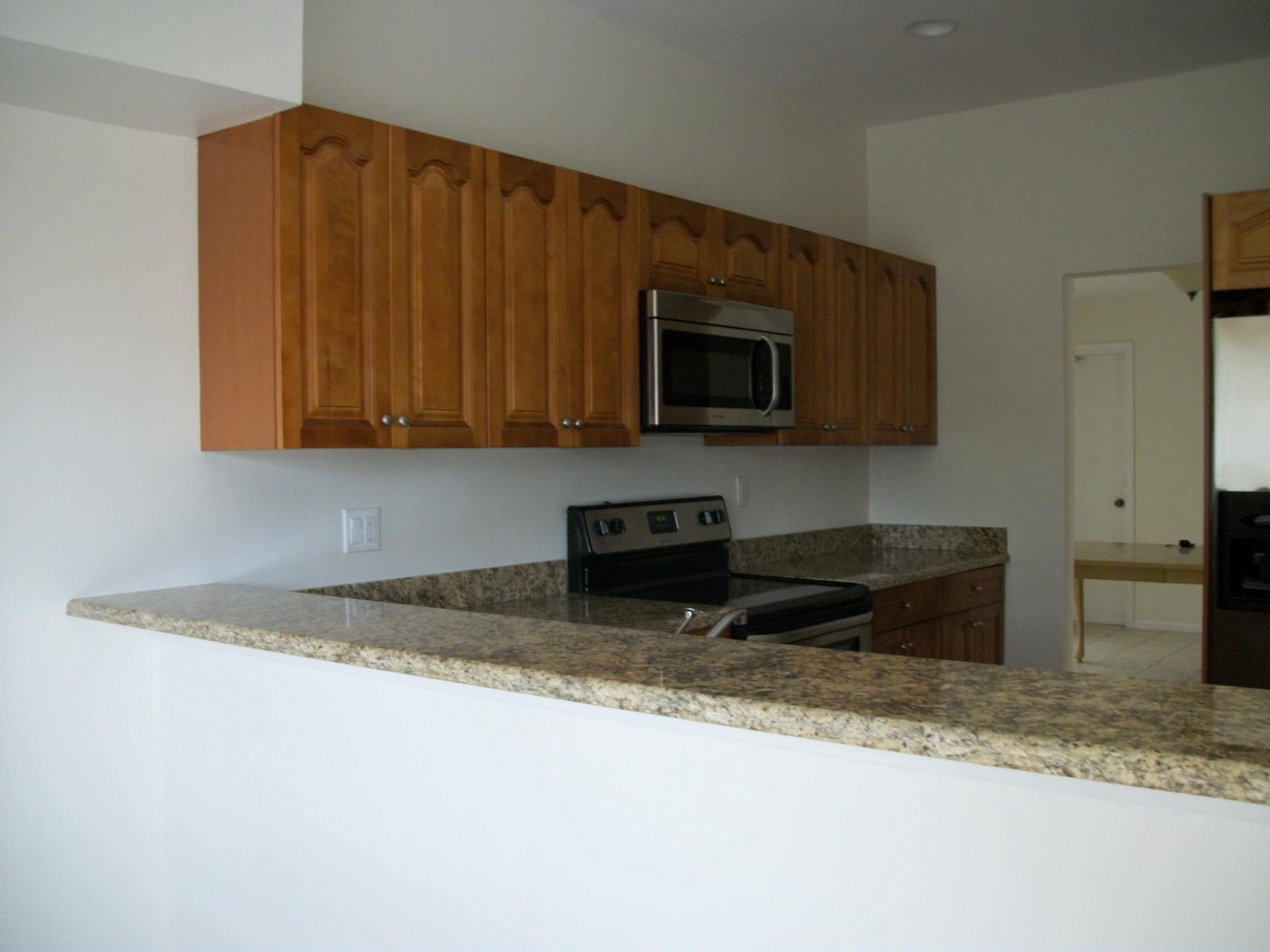 7615 Solimar Circle Boca Raton, FL 33433 - Photo 5 of 32 Kitchen wood cabinets