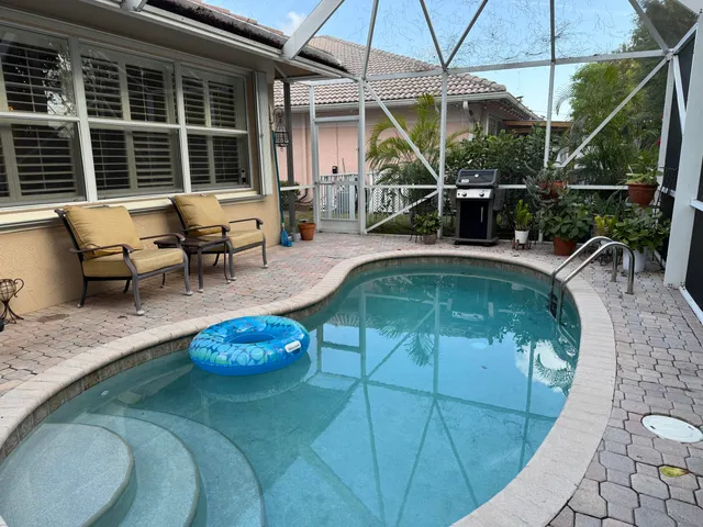 a view of a chairs and table in the outdoor