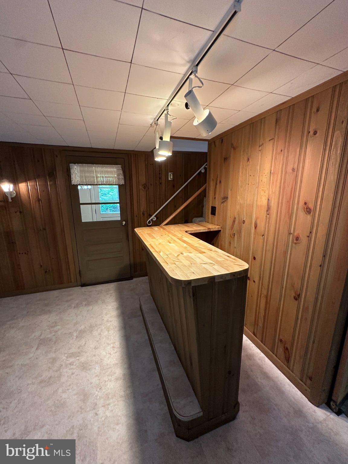 3527 Ridgeway Road Harrisburg, PA 17109 - Photo 38 of 55 Cozy basement bar with warm wood tones.
