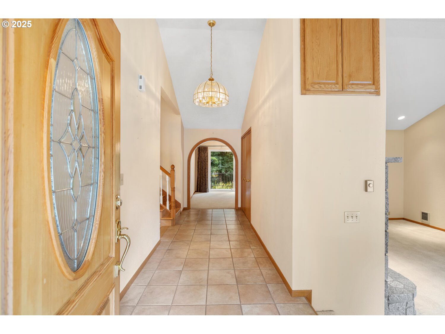 3208 Northwest 199th Street Ridgefield, WA 98642 - Photo 14 of 48 a view of a hallway with wooden floor
