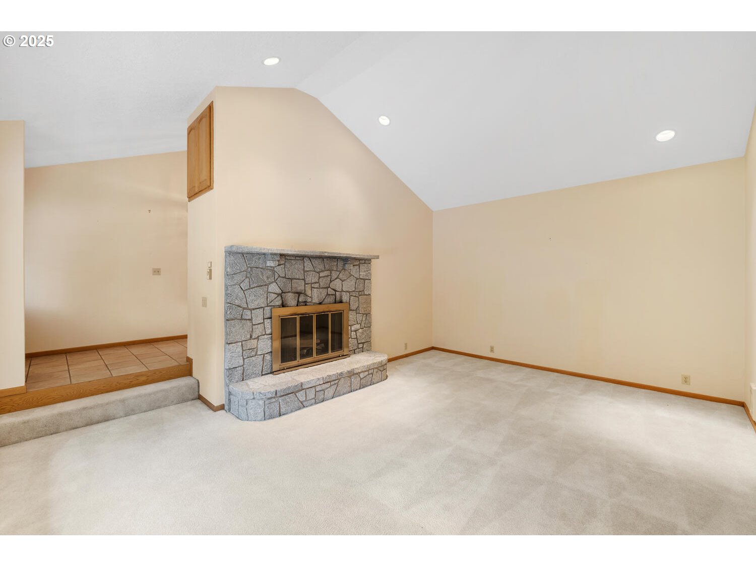 3208 Northwest 199th Street Ridgefield, WA 98642 - Photo 17 of 48 a view of an empty room and a fireplace