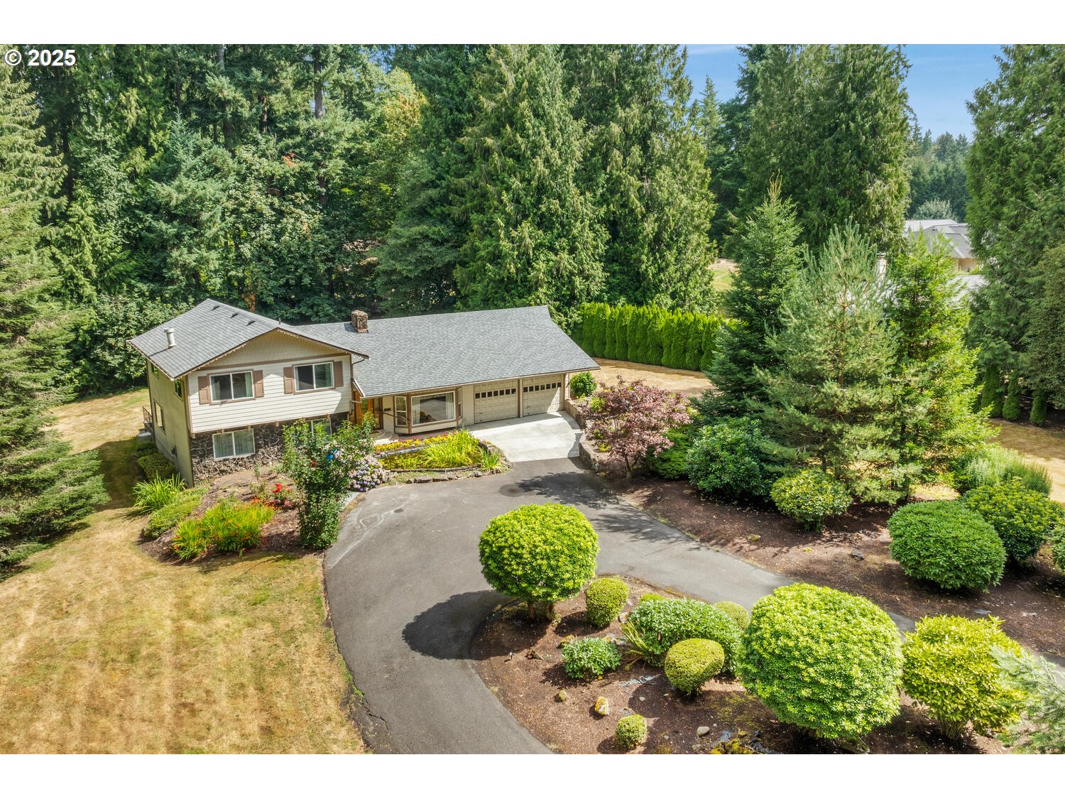 3208 Northwest 199th Street Ridgefield, WA 98642 - Photo 2 of 48 a aerial view of a house with garden