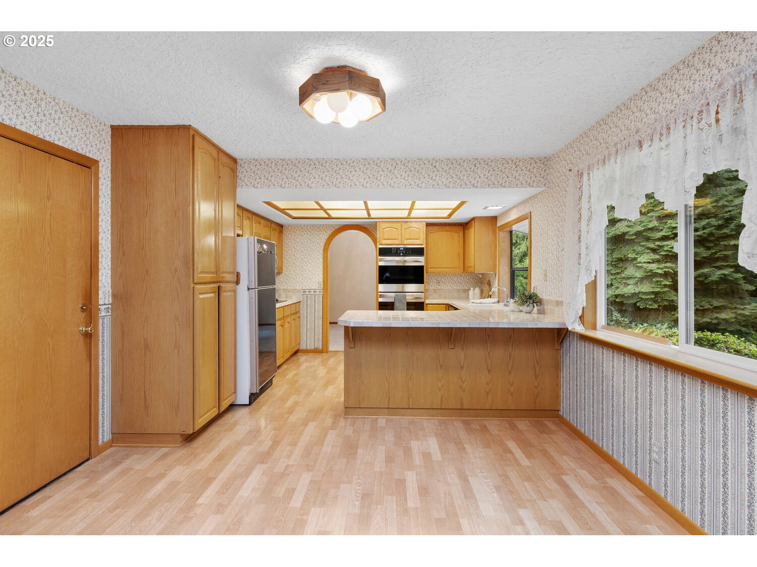 3208 Northwest 199th Street Ridgefield, WA 98642 - Photo 23 of 48 a view of kitchen with furniture and window