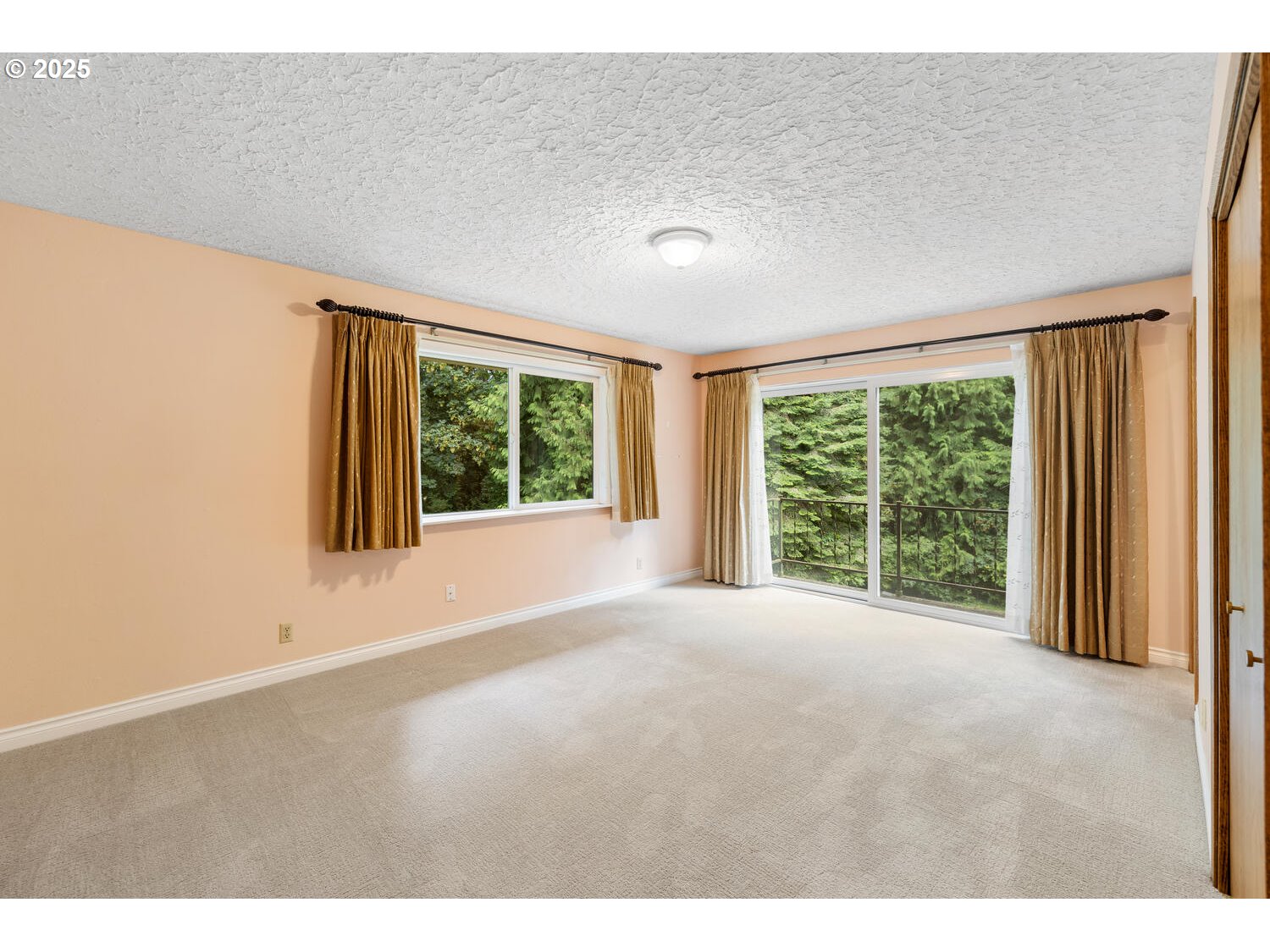 3208 Northwest 199th Street Ridgefield, WA 98642 - Photo 28 of 48 a view of an empty room with a window