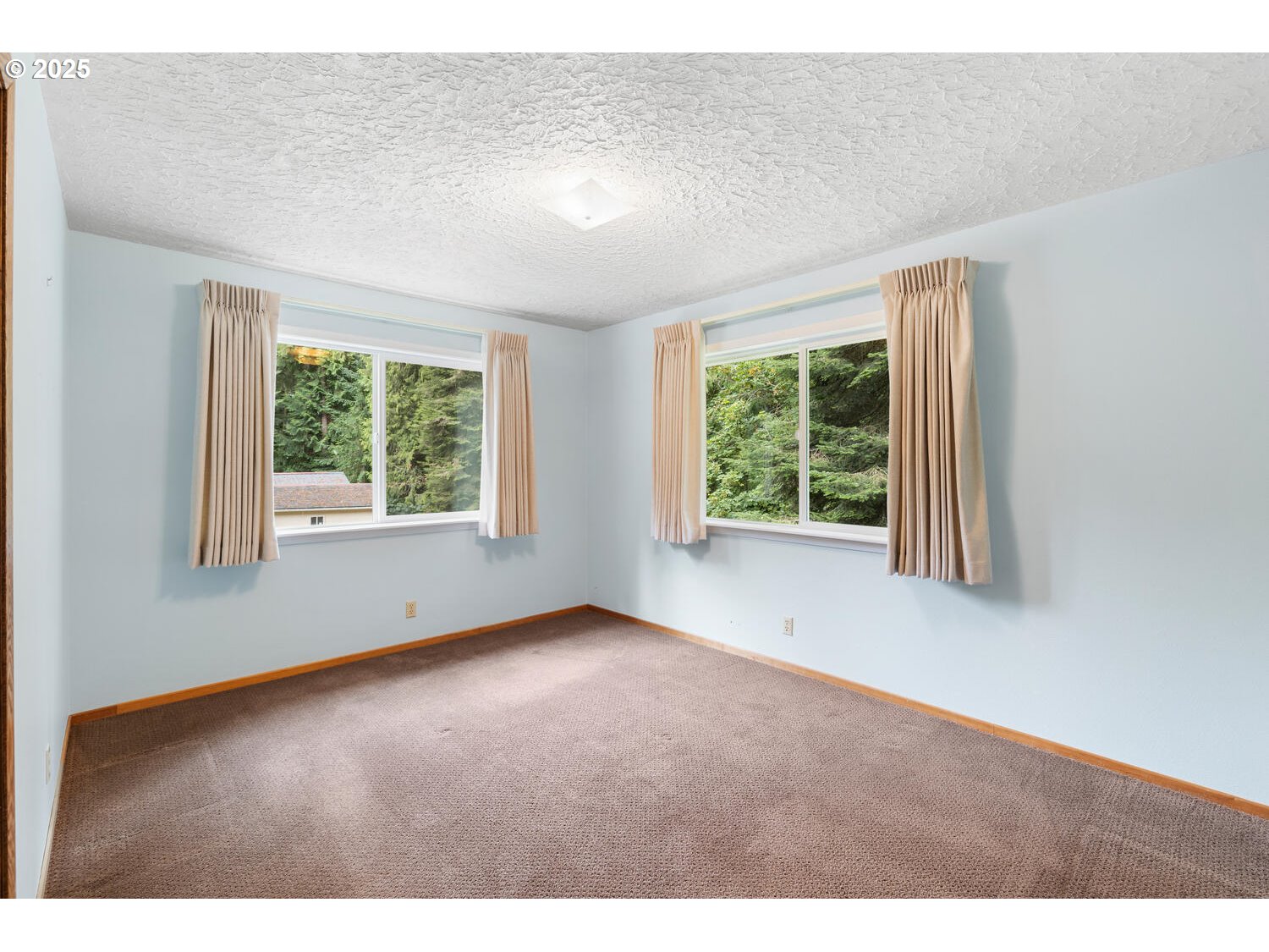 3208 Northwest 199th Street Ridgefield, WA 98642 - Photo 35 of 48 an empty room with windows