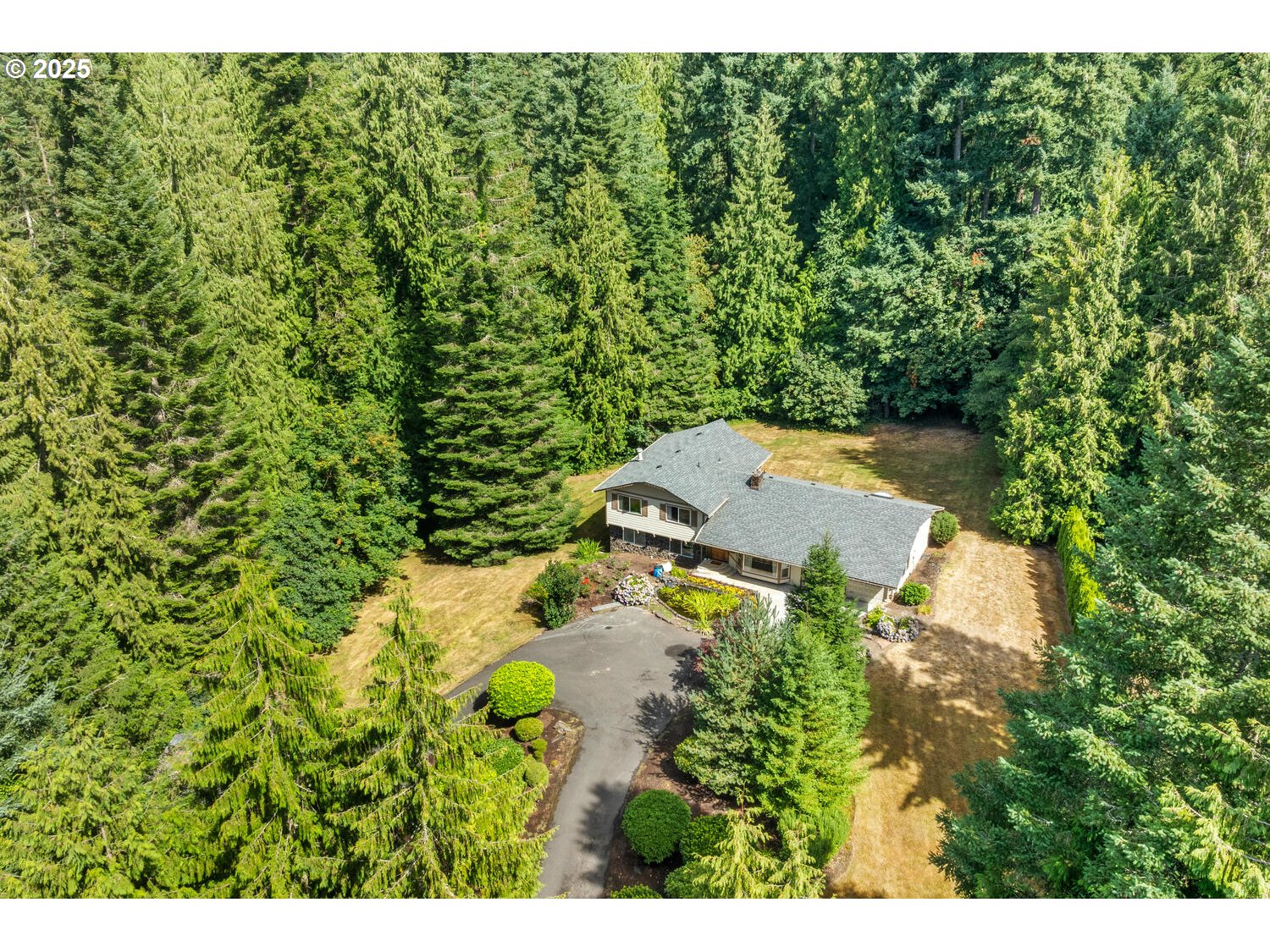 3208 Northwest 199th Street Ridgefield, WA 98642 - Photo 47 of 48 a view of a house with a yard