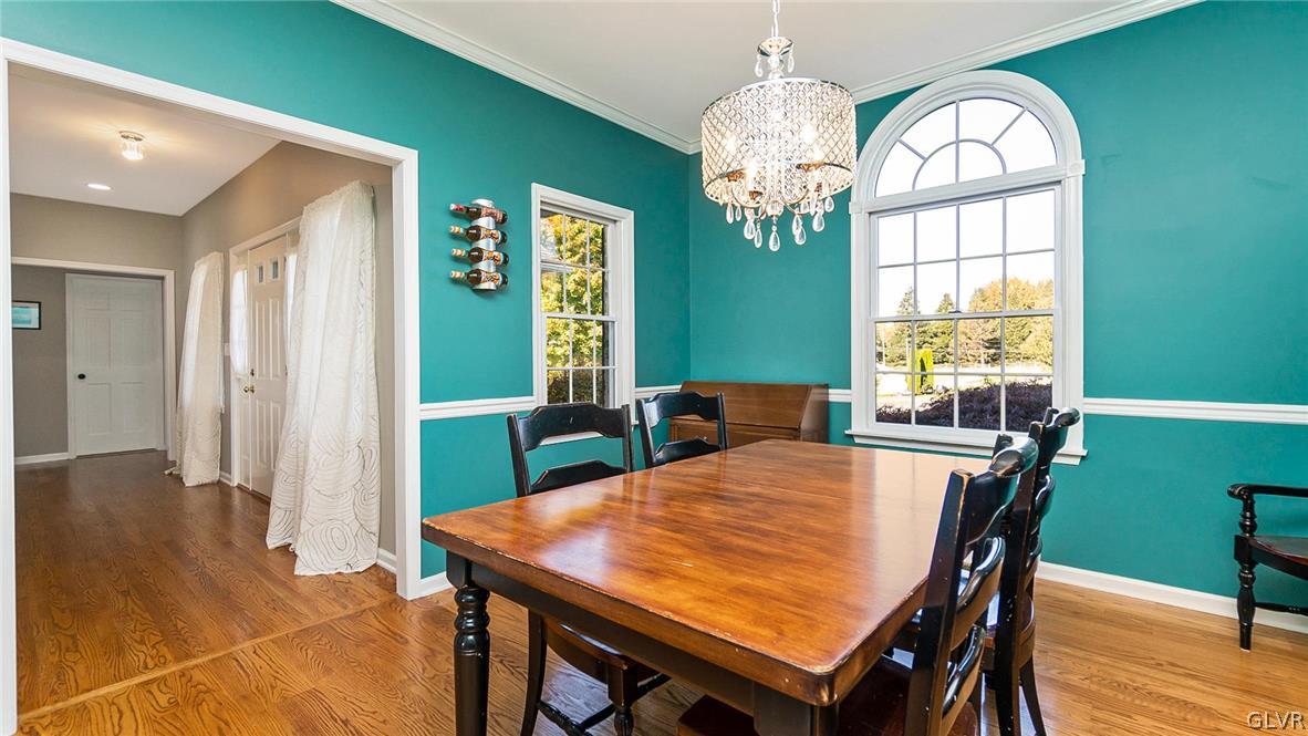 573 West Moorestown Road Nazareth, PA 18064 - Photo 11 of 46 a view of a dining room with furniture window and wooden floor