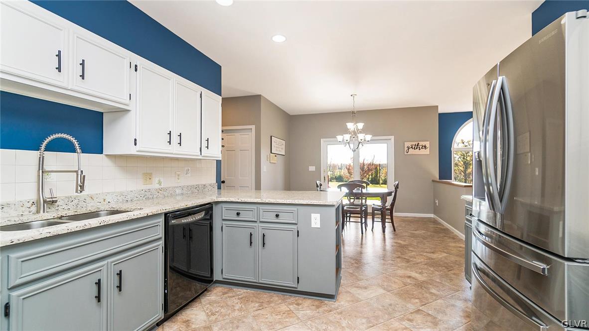 573 West Moorestown Road Nazareth, PA 18064 - Photo 12 of 46 a kitchen with a sink appliances and cabinets
