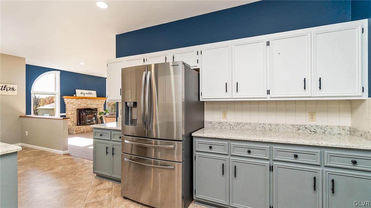 573 West Moorestown Road Nazareth, PA 18064 - Photo 14 of 46 a kitchen with appliances a refrigerator and cabinets