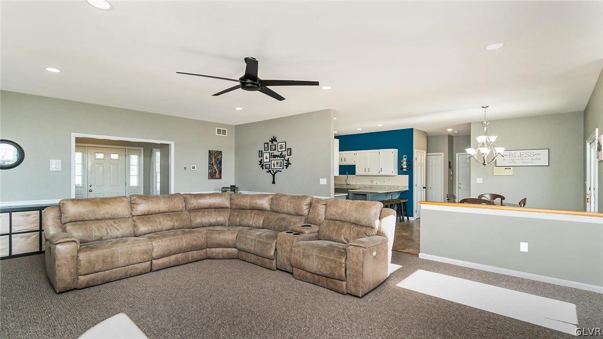 573 West Moorestown Road Nazareth, PA 18064 - Photo 9 of 46 a living room with furniture and a ceiling fan