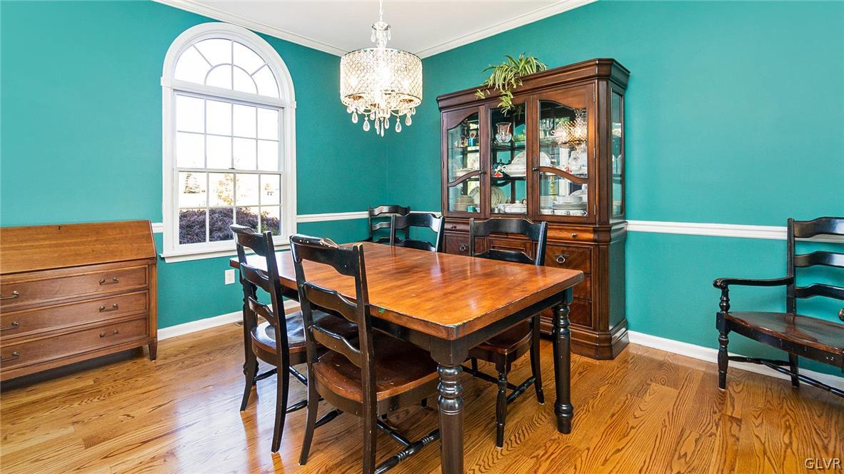 573 West Moorestown Road Nazareth, PA 18064 - Photo 10 of 46 a dining room with furniture a window and wooden floor