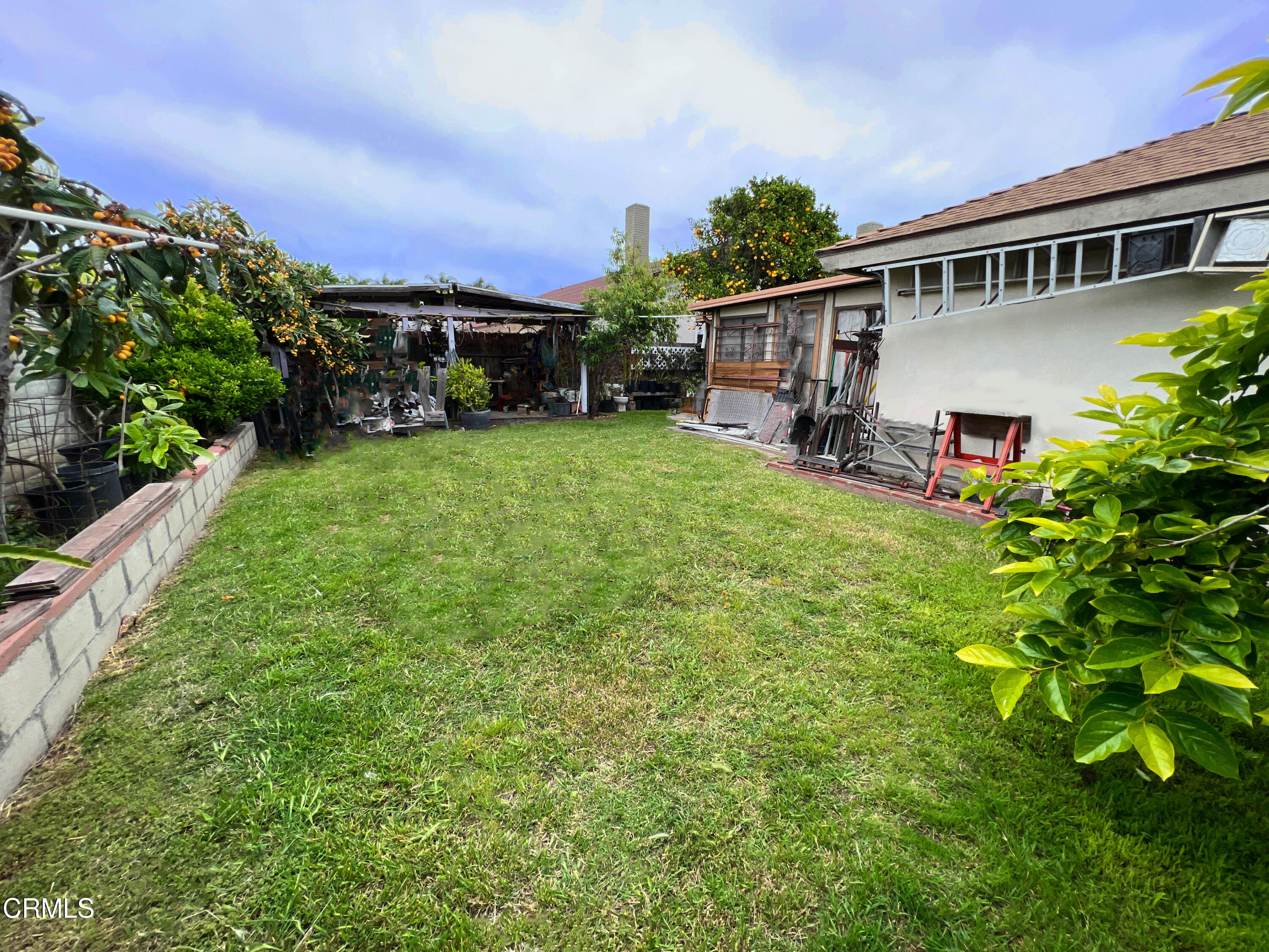 5001 Ivan Drive Oxnard, CA 93033 - Photo 12 of 16 a view of a house with backyard and sitting area
