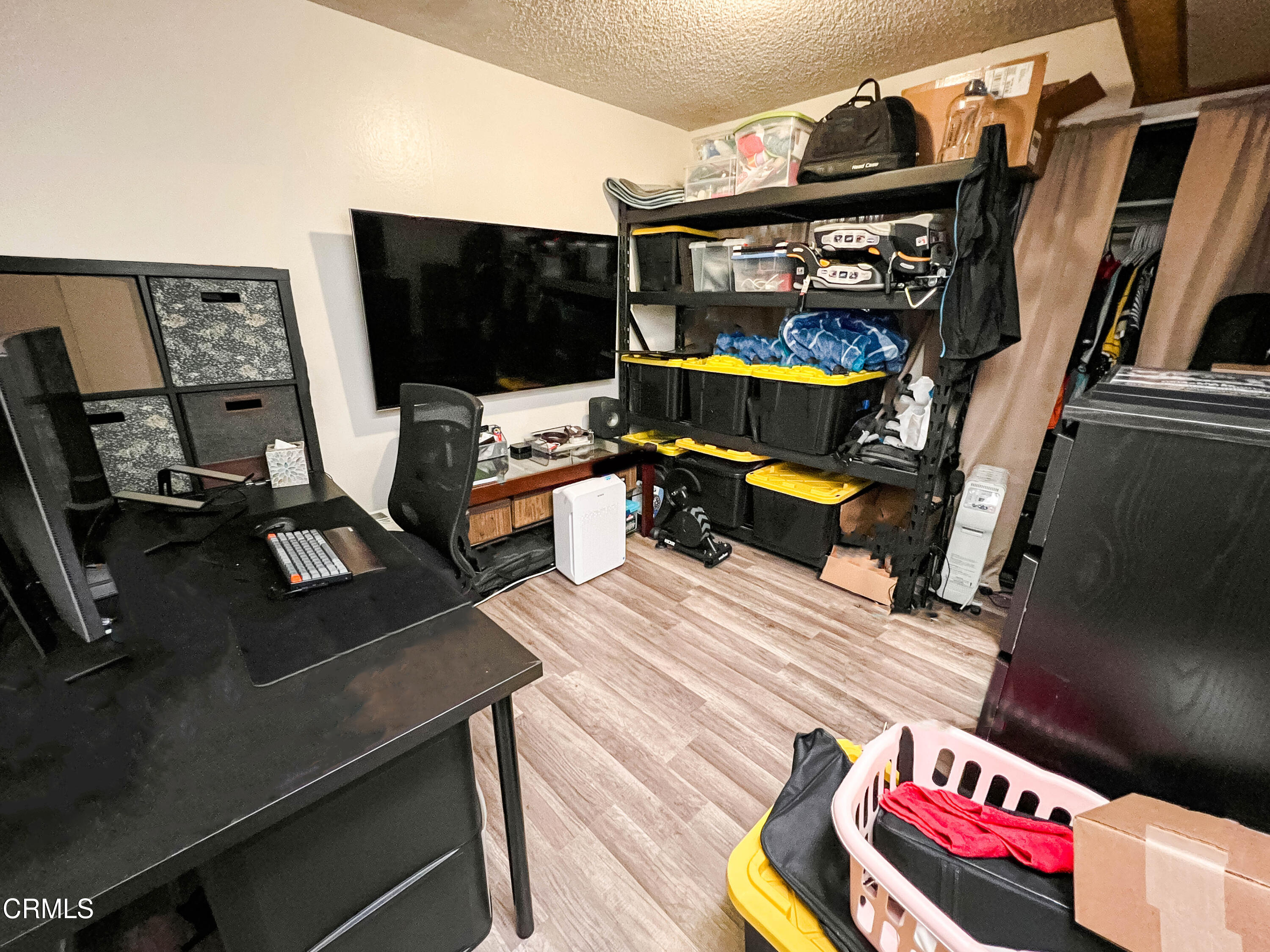 5001 Ivan Drive Oxnard, CA 93033 - Photo 6 of 16 a living room with furniture and a flat screen tv