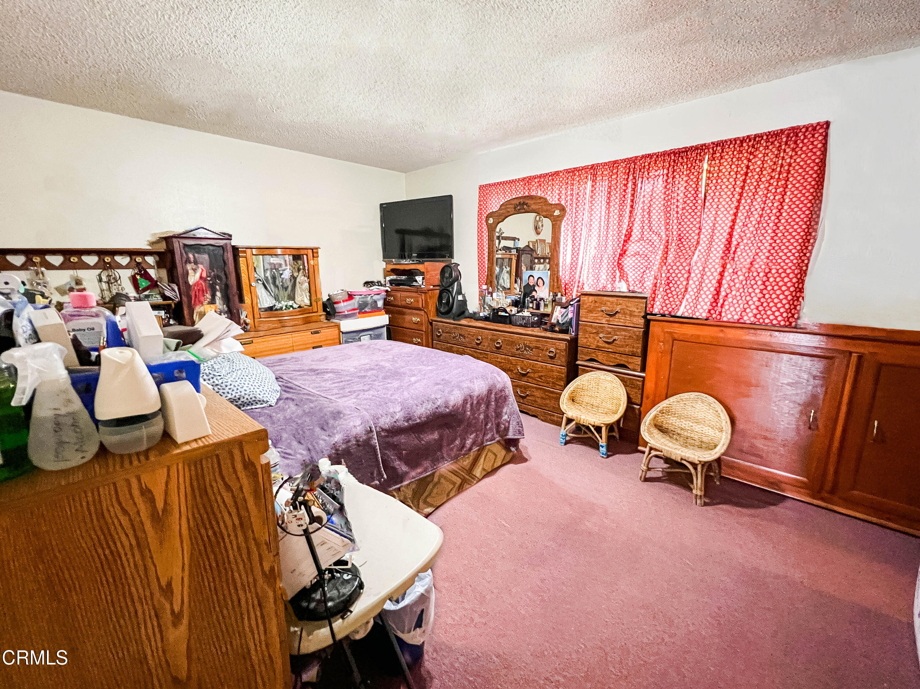 5001 Ivan Drive Oxnard, CA 93033 - Photo 7 of 16 a bedroom with furniture and a window
