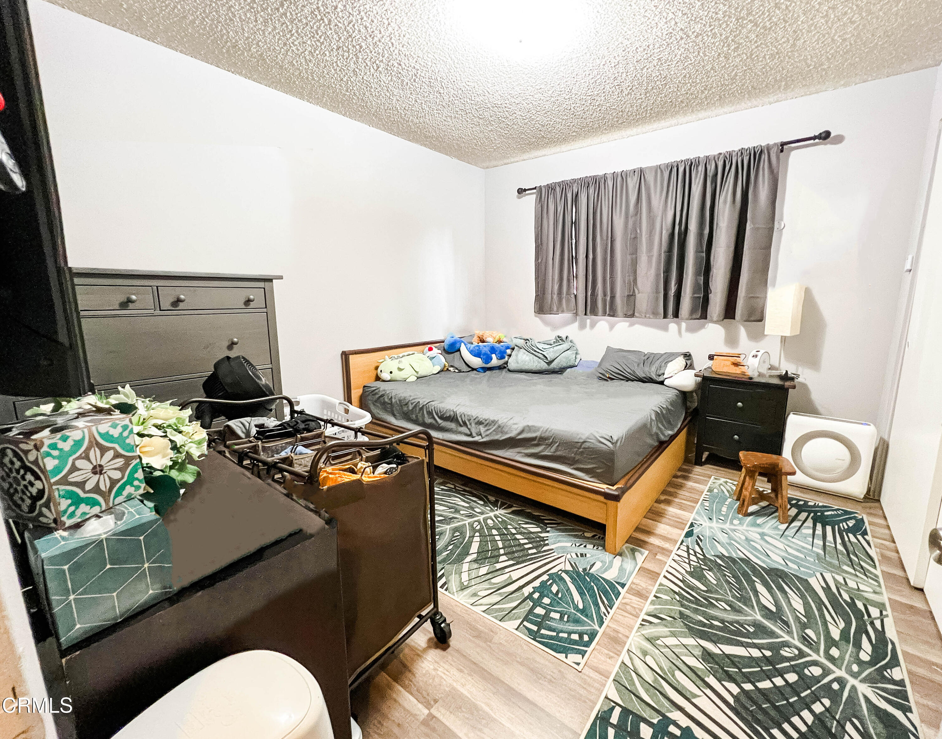 5001 Ivan Drive Oxnard, CA 93033 - Photo 8 of 16 a living room with furniture and a table