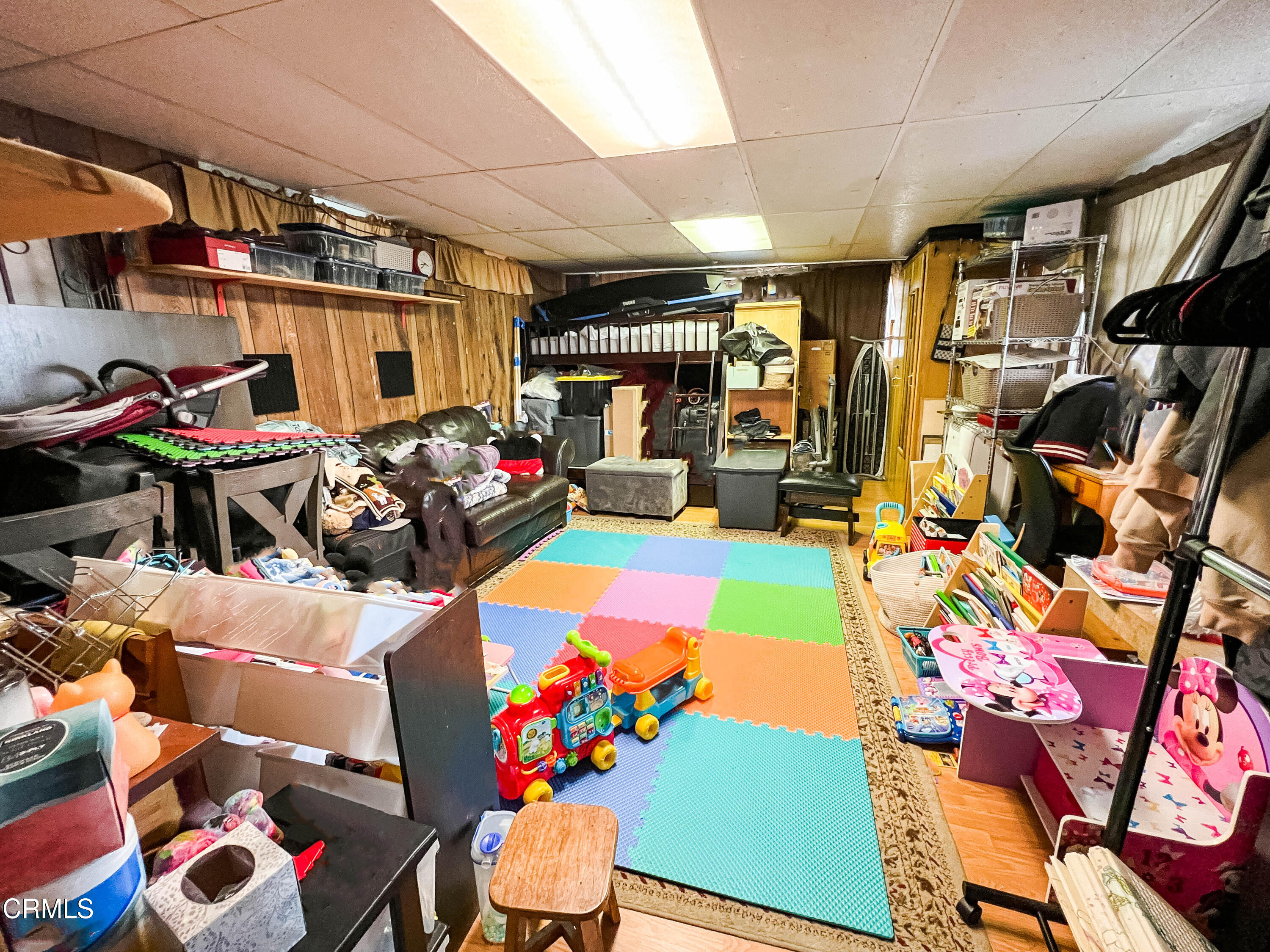 5001 Ivan Drive Oxnard, CA 93033 - Photo 9 of 16 a garage with furniture and bicycles