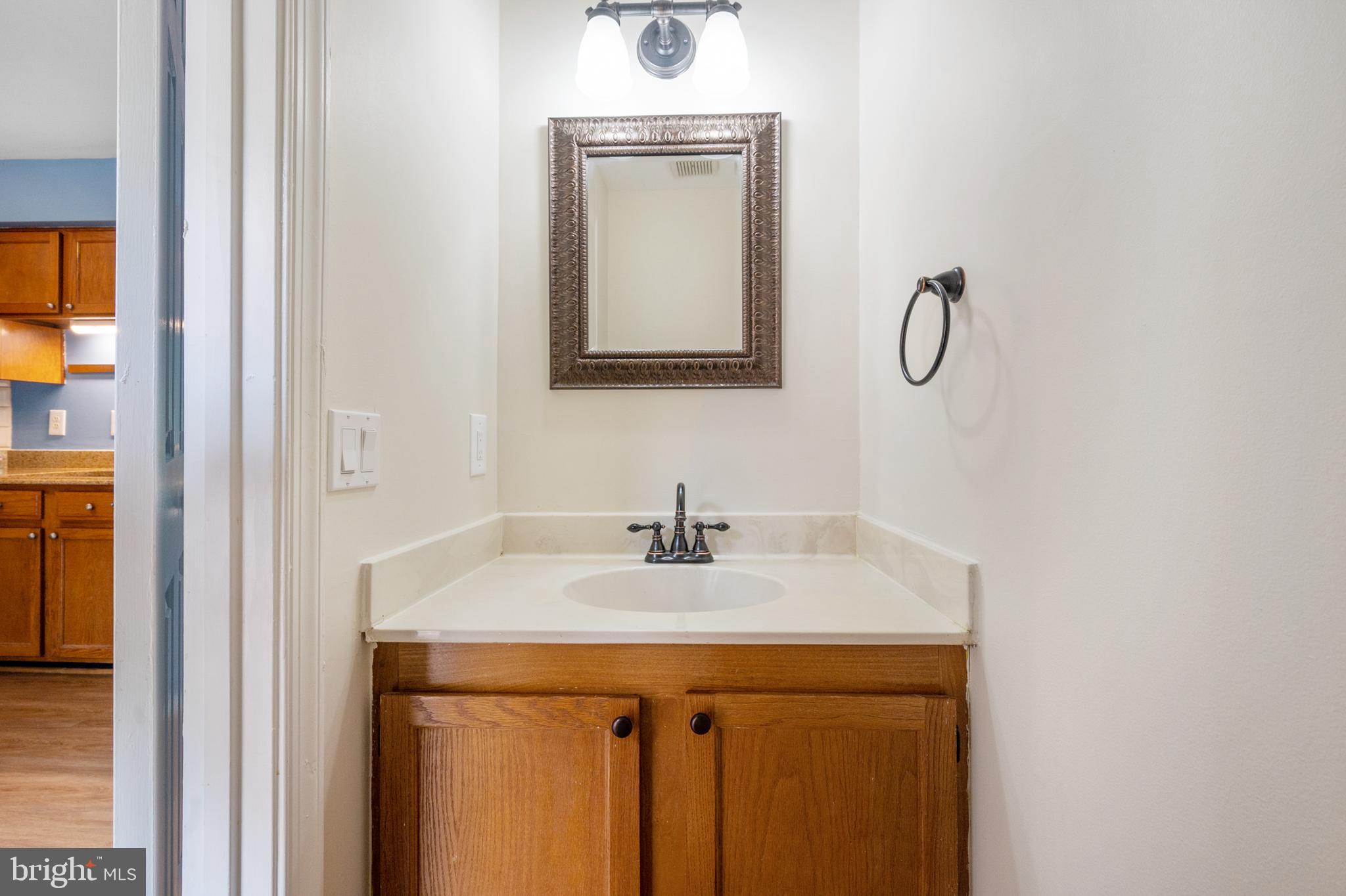 14676 Basingstoke Loop Centreville, VA 20120 - Photo 13 of 39 MAIN LEVEL HALF BATH