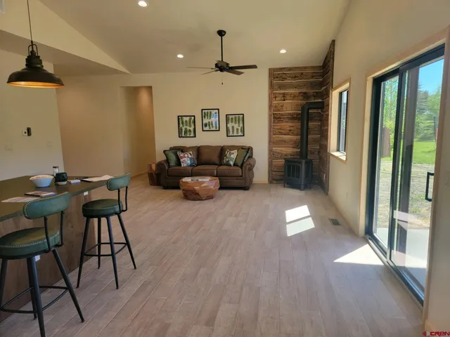 a bedroom with bed and window
